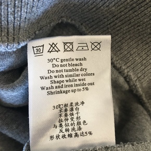 Designer Remix gray crew neck sweater with ruffles at hem and mid arm - Picture 5 of 5